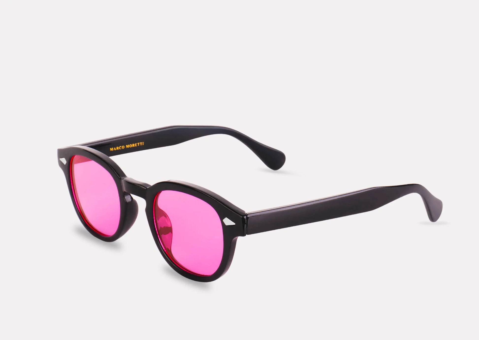 "Lunettes Ibiza – Lunettes montures noires à verres roses"