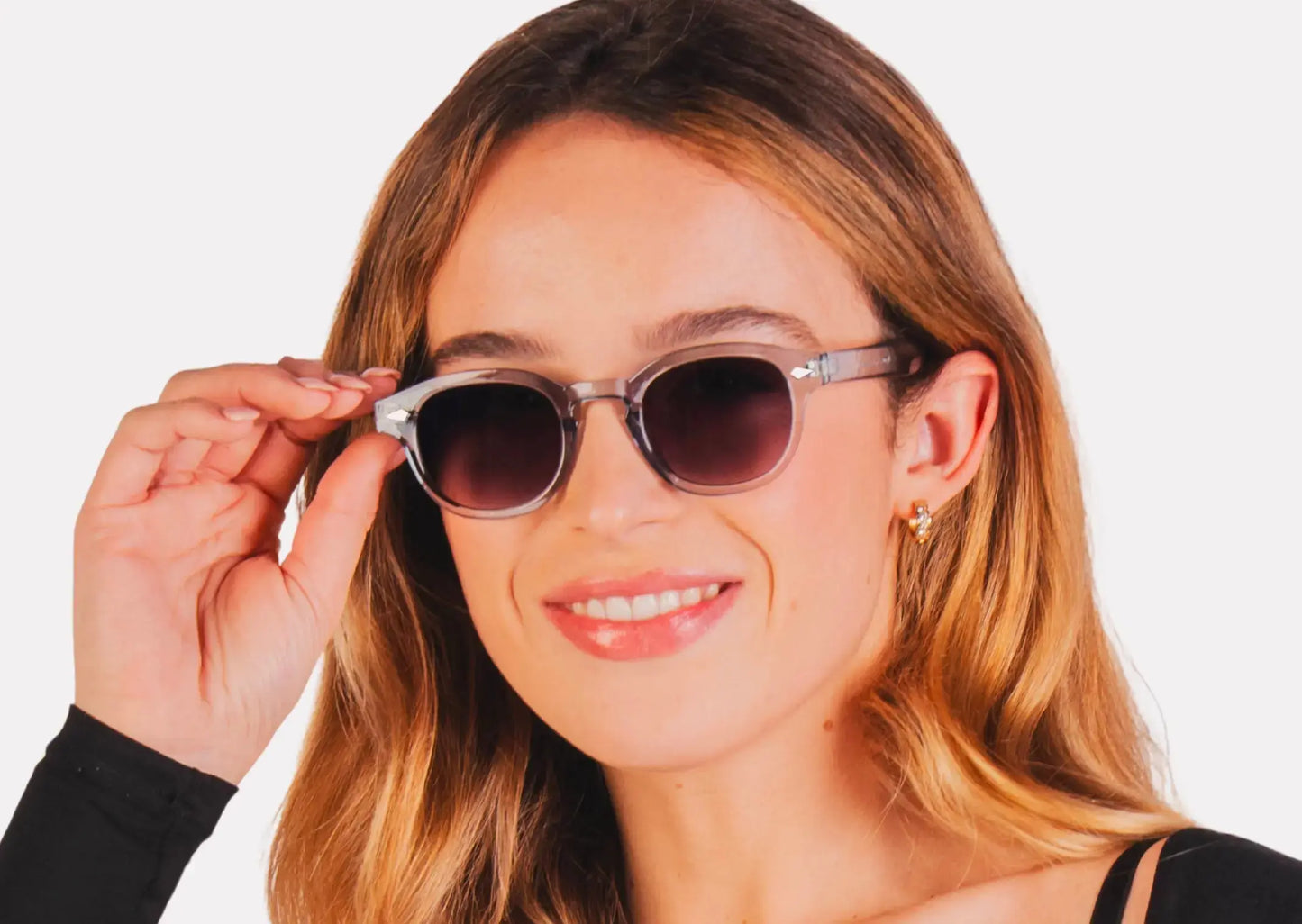 "Lunettes femme– monture Transparente et verres fumés chic"
