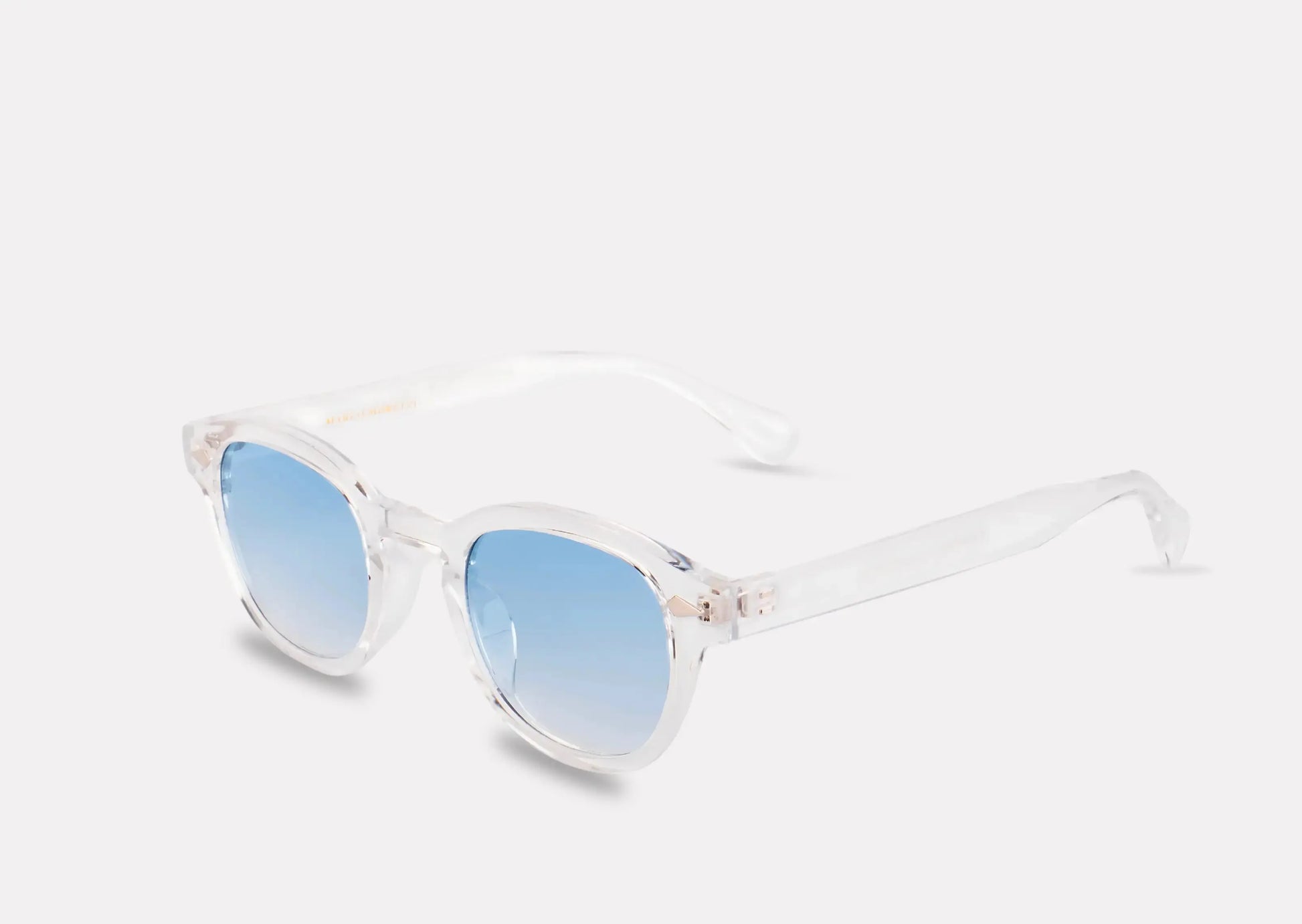 "Lunettes Riviera – monture transparentes à verres bleus"